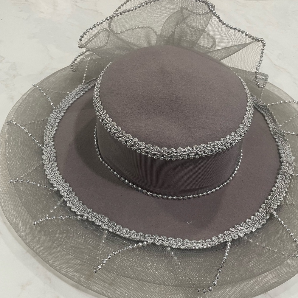 Chic Women's Hat with Silver Detailing